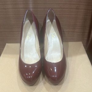 Marc Fisher wine color patent leather pumps.  Worn once.
